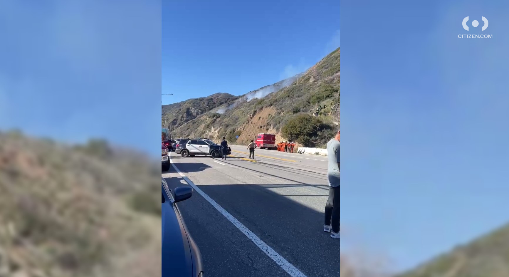 A 1-acre brush fire burns in Malibu on Jan. 21, 2023, as shown in video posted to the Citizen app.