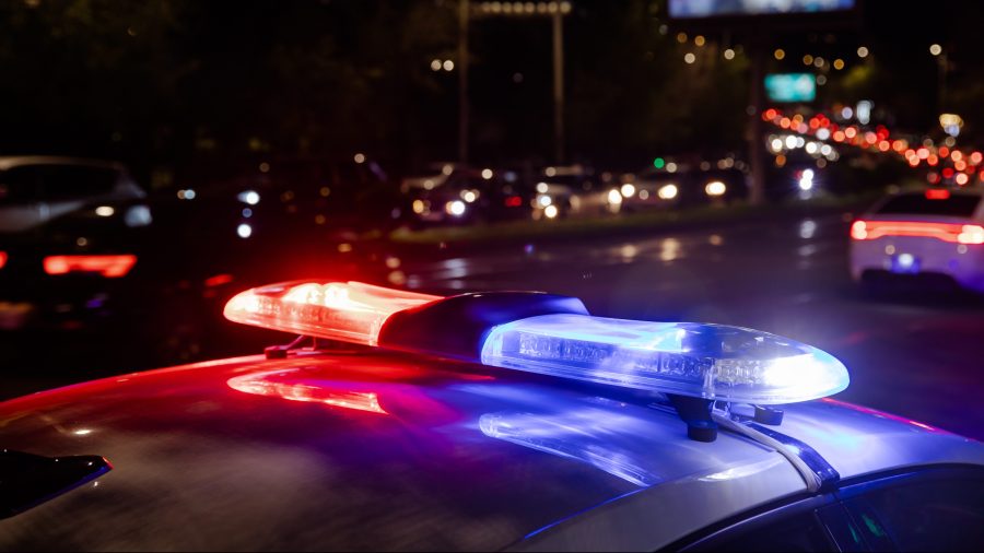 Police car lights at night in city