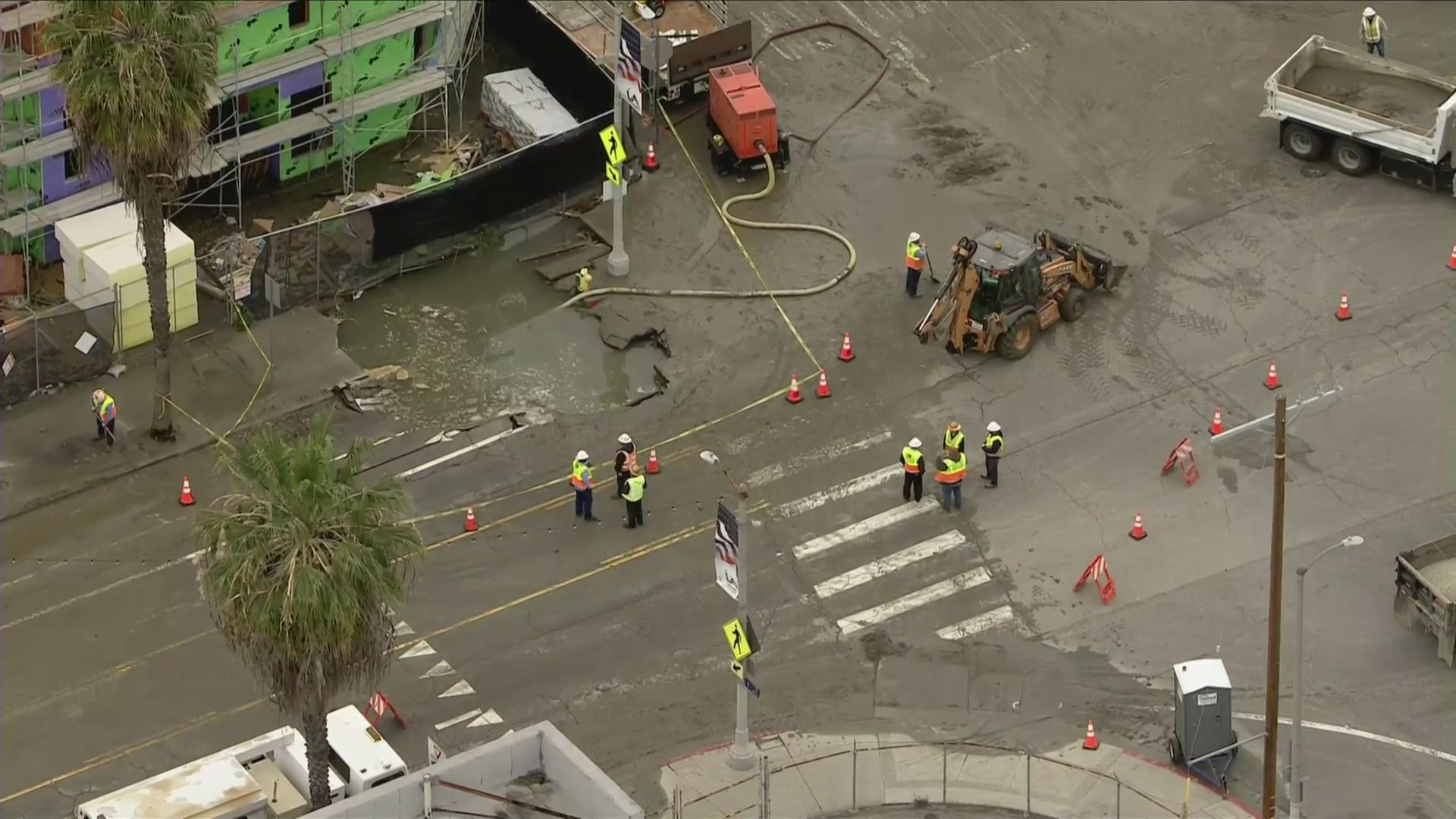 A sinkhole in Wilmington impacted traffic and businesses on Feb. 14, 2023. (KTLA)