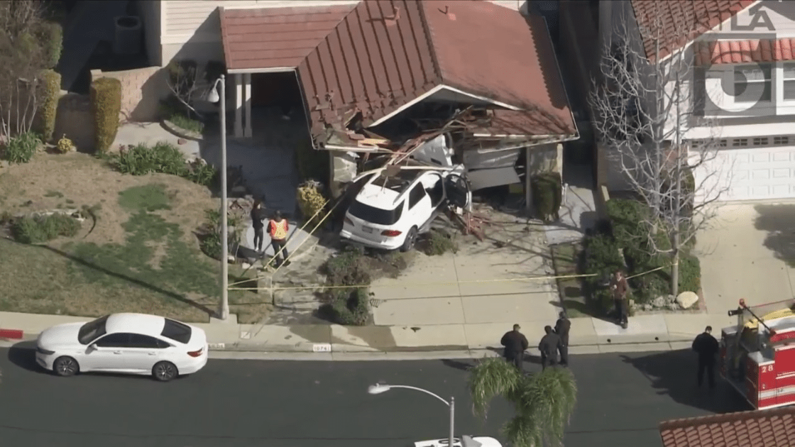 An SUV slammed into a home in Porter Ranch on Feb. 16, 2023. (KTLA)