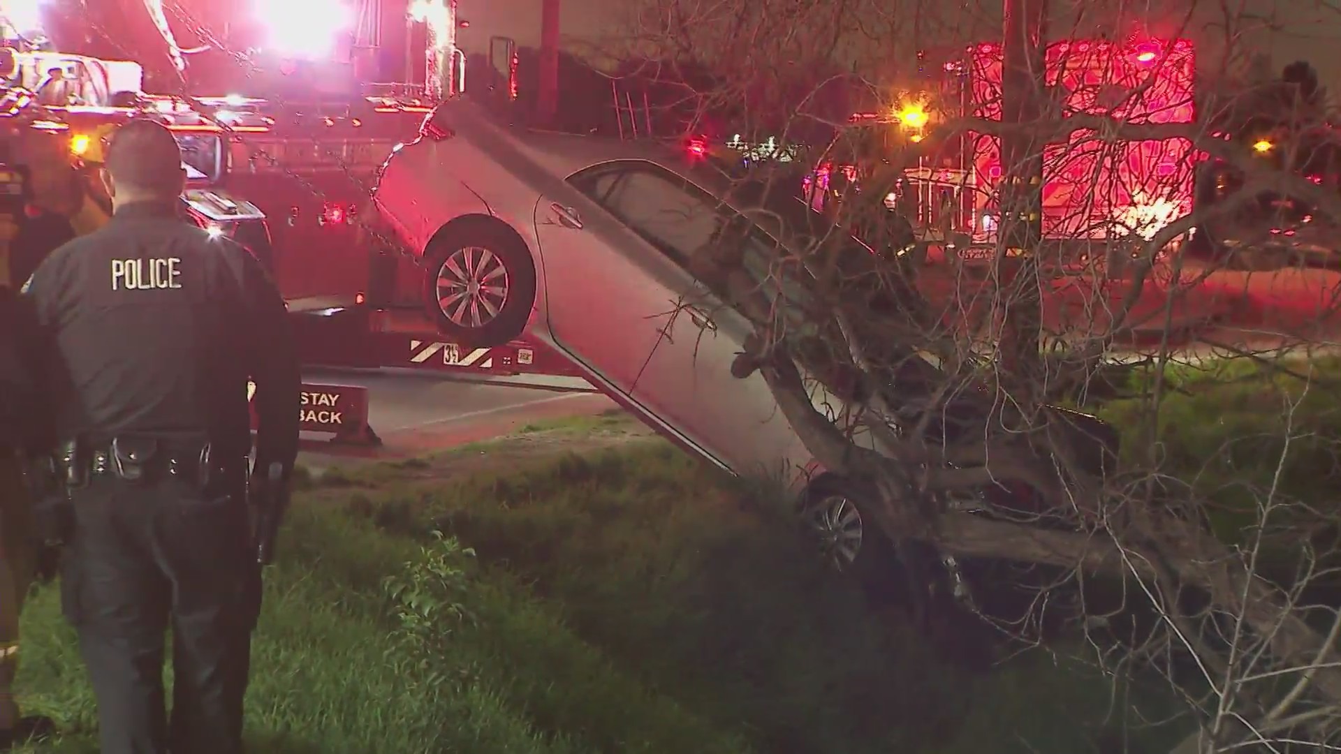 A woman was hospitalized after her vehicle went down a 100-foot embankment in Beverly Crest on Feb. 4, 2023. (KTLA)