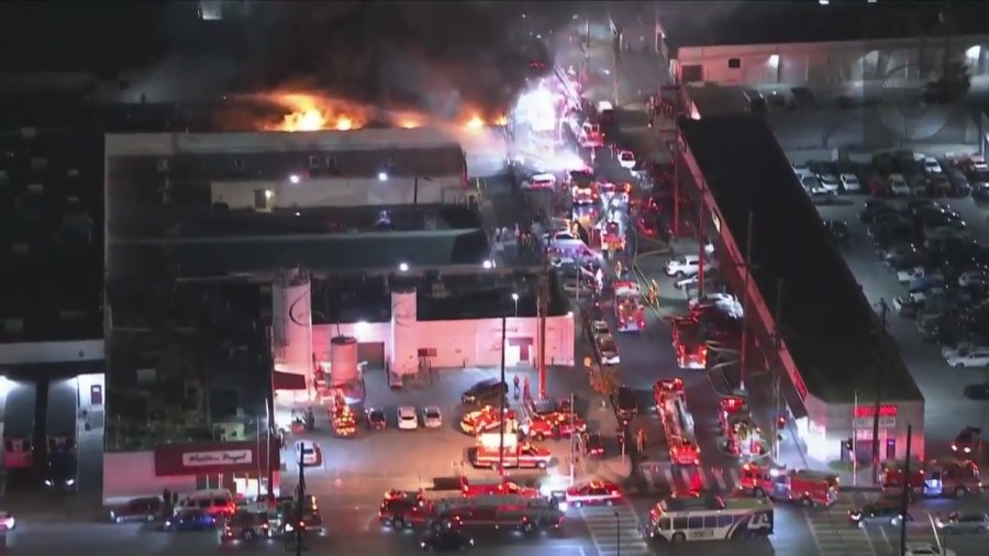 Crews tackled a large fire consuming a commercial building in Van Nuys on Feb. 16, 2023. (KTLA)