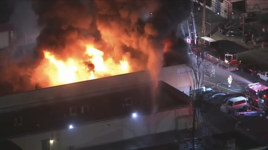 Crews tackled a large fire consuming a commercial building in Van Nuys on Feb. 16, 2023. (KTLA)