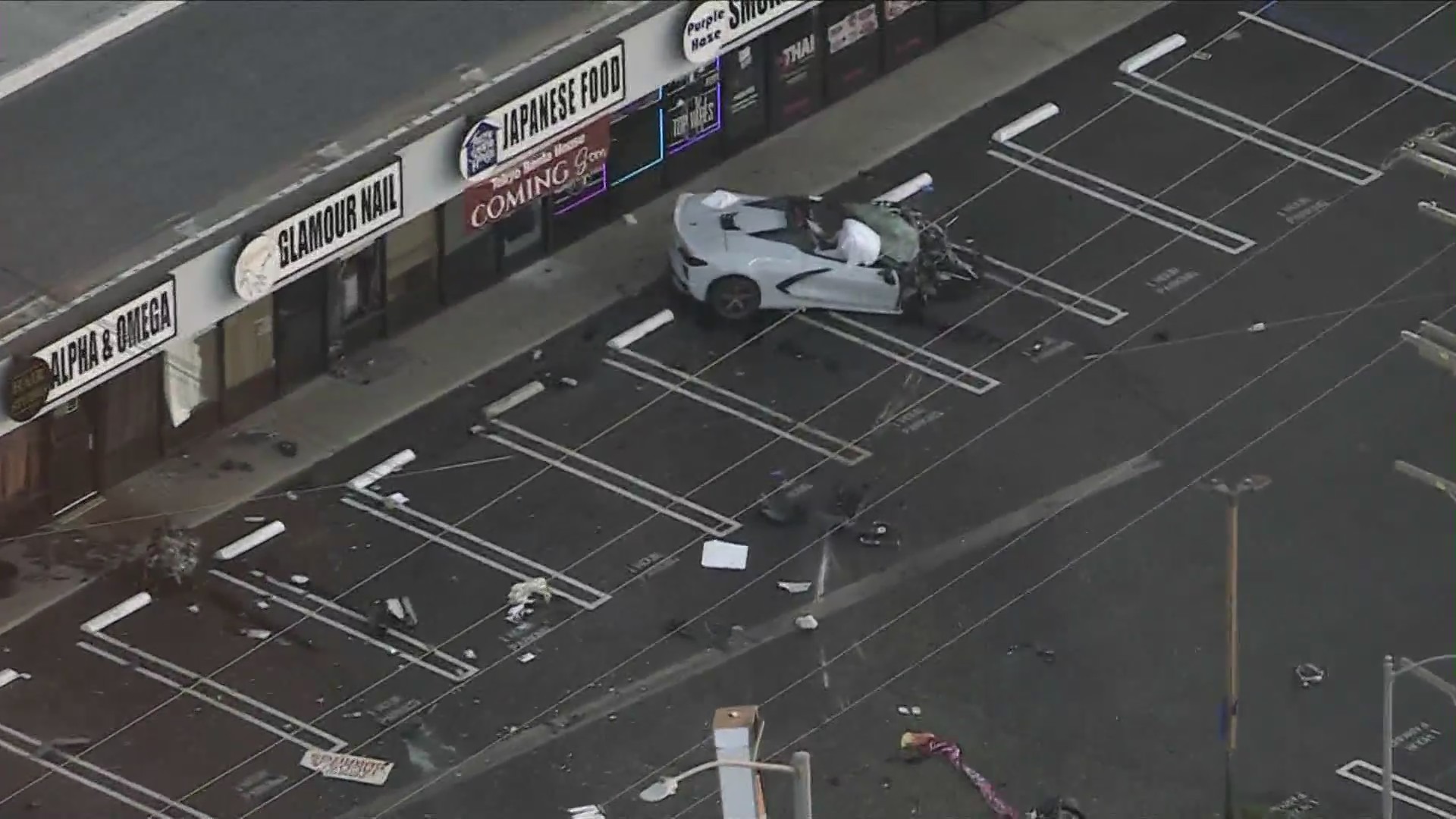 Aftermath of a speeding Corvette crashing into another vehicle in Lake Balboa on Feb. 8, 2023. (KTLA)