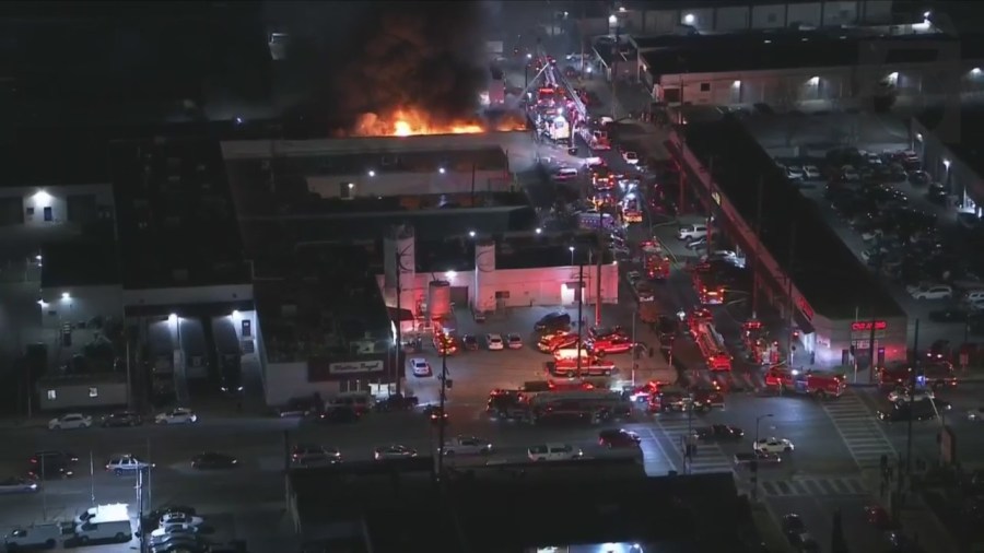 Crews tackled a large fire consuming a commercial building in Van Nuys on Feb. 16, 2023. (KTLA)