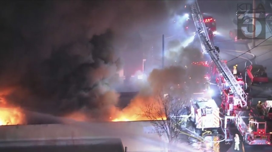 Crews tackled a large fire consuming a commercial building in Van Nuys on Feb. 16, 2023. (KTLA)