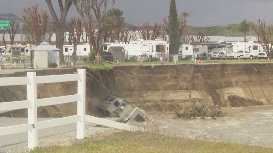 An RV tumbled off an embankment and into a river in Castaic on Feb. 25, 2023. (KTLA)