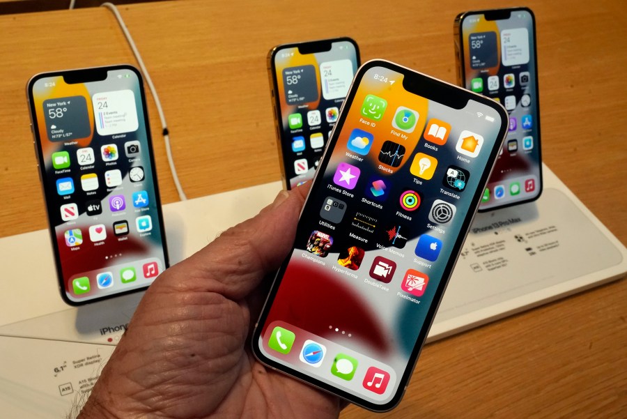 The line-up of the Apple iPhone 13 is displayed on their first day of sale, in New York on Sept. 24, 2021. (Richard Drew/Associated Press)