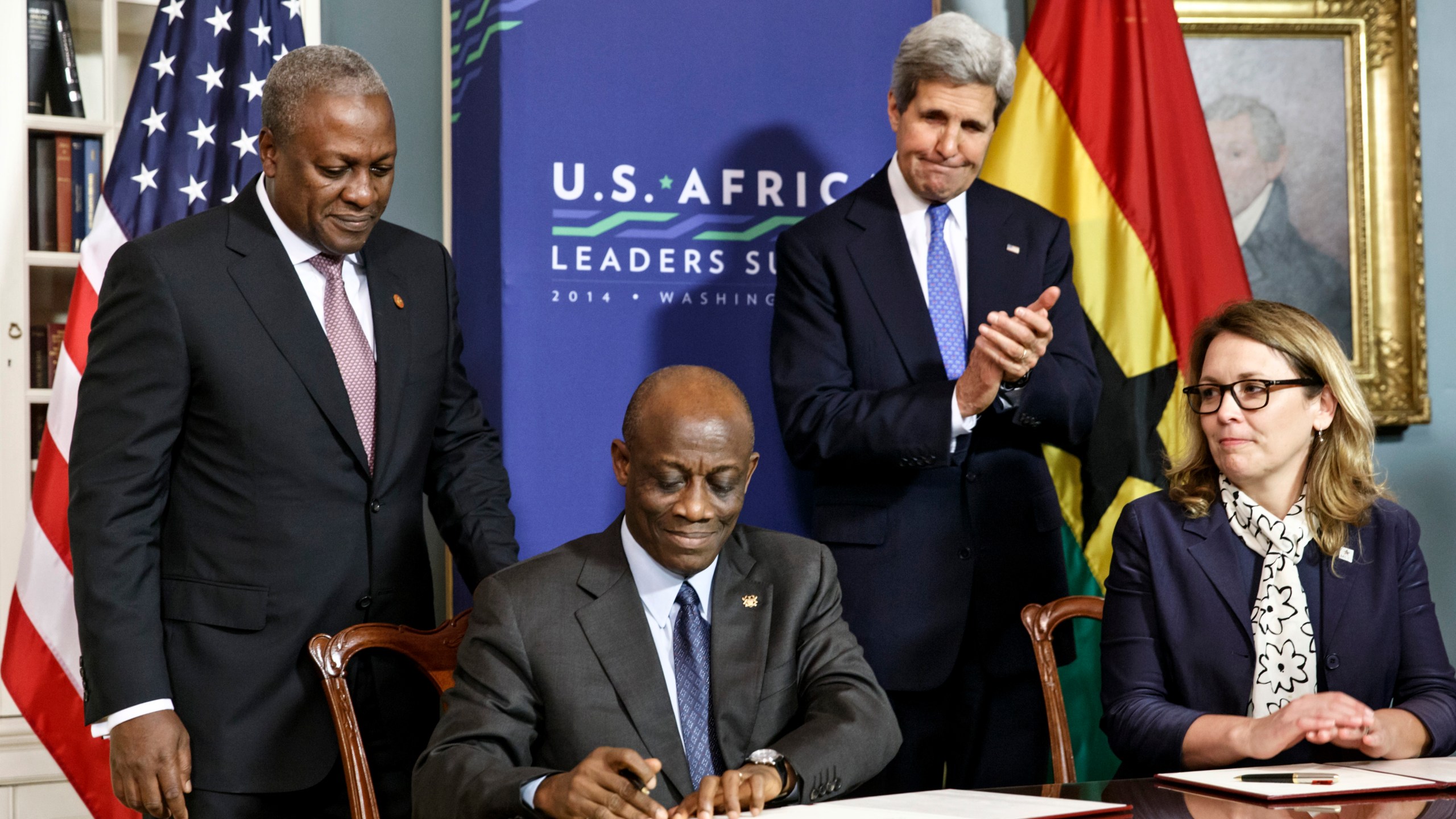 From left, Ghana's President John Dramani Mahama, Ghana's Finance Minister Seth Terkper, Secretary of State John Kerry and CEO of the Millennium Challenge Corporation Dana Hyde participate in the Ghana Compact signing ceremony during the U.S. Africa Leaders Summit at the State Department in Washington on Aug. 5, 2014. A business jet may have experienced problems with its stability before encountering turbulence or some other roughness that caused the death of Hyde, who served in prominent posts in two presidential administrations, officials said Monday, March 6, 2023. (AP Photo/J. Scott Applewhite, File)