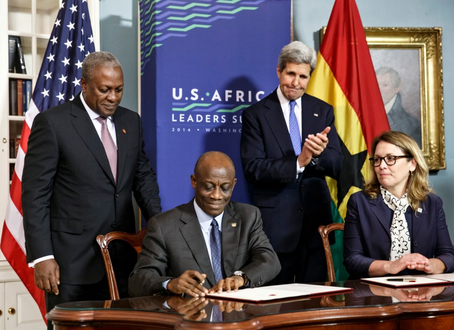 From left, Ghana's President John Dramani Mahama, Ghana's Finance Minister Seth Terkper, Secretary of State John Kerry and CEO of the Millennium Challenge Corporation Dana Hyde participate in the Ghana Compact signing ceremony during the U.S. Africa Leaders Summit at the State Department in Washington on Aug. 5, 2014. A business jet may have experienced problems with its stability before encountering turbulence or some other roughness that caused the death of Hyde, who served in prominent posts in two presidential administrations, officials said Monday, March 6, 2023. (AP Photo/J. Scott Applewhite, File)