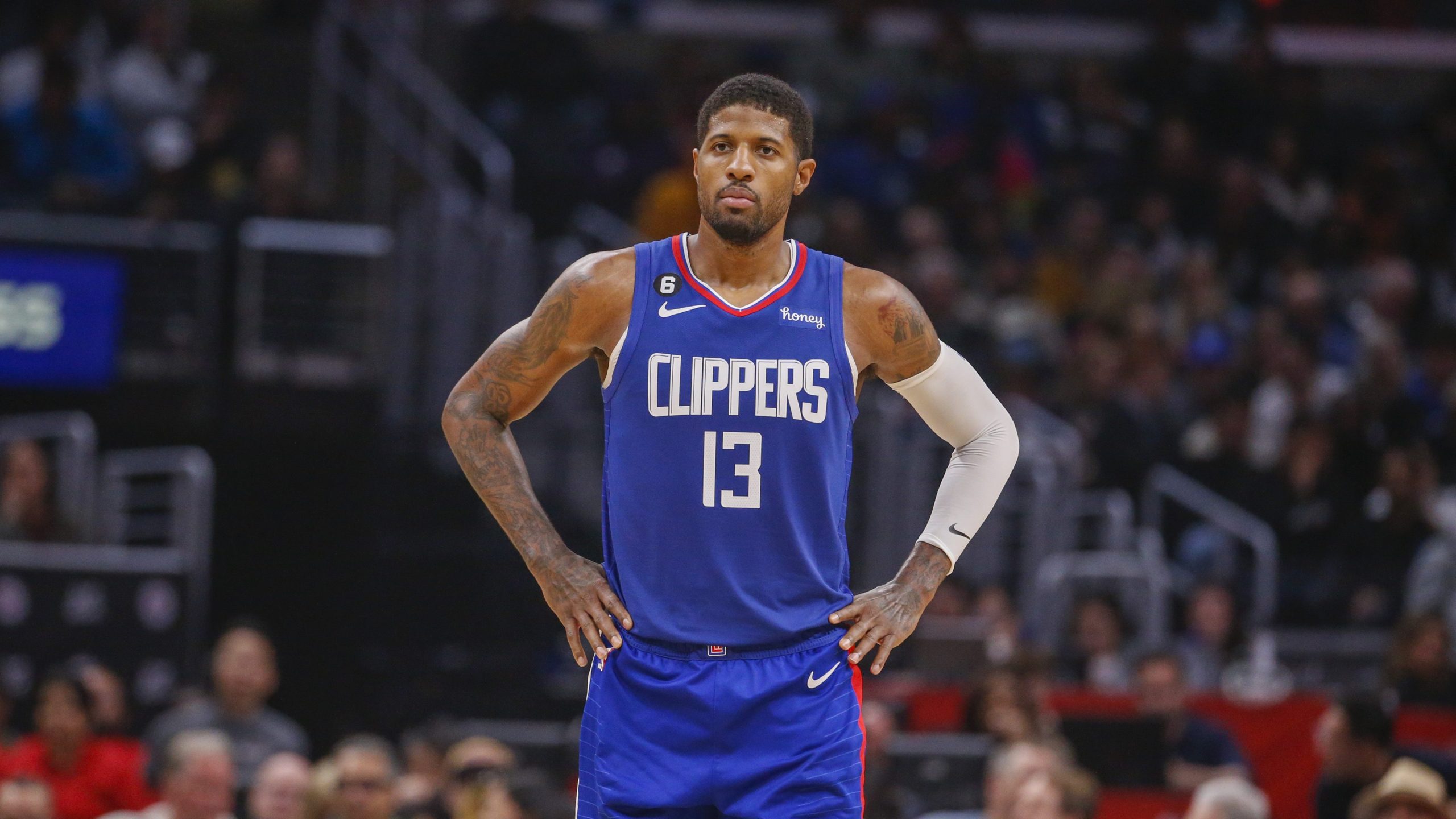 Los Angeles Clippers forward Paul George looks on during the second half of an NBA basketball game against the Oklahoma City Thunder Tuesday, March 21, 2023, in Los Angeles. (AP Photo/Ringo H.W. Chiu)