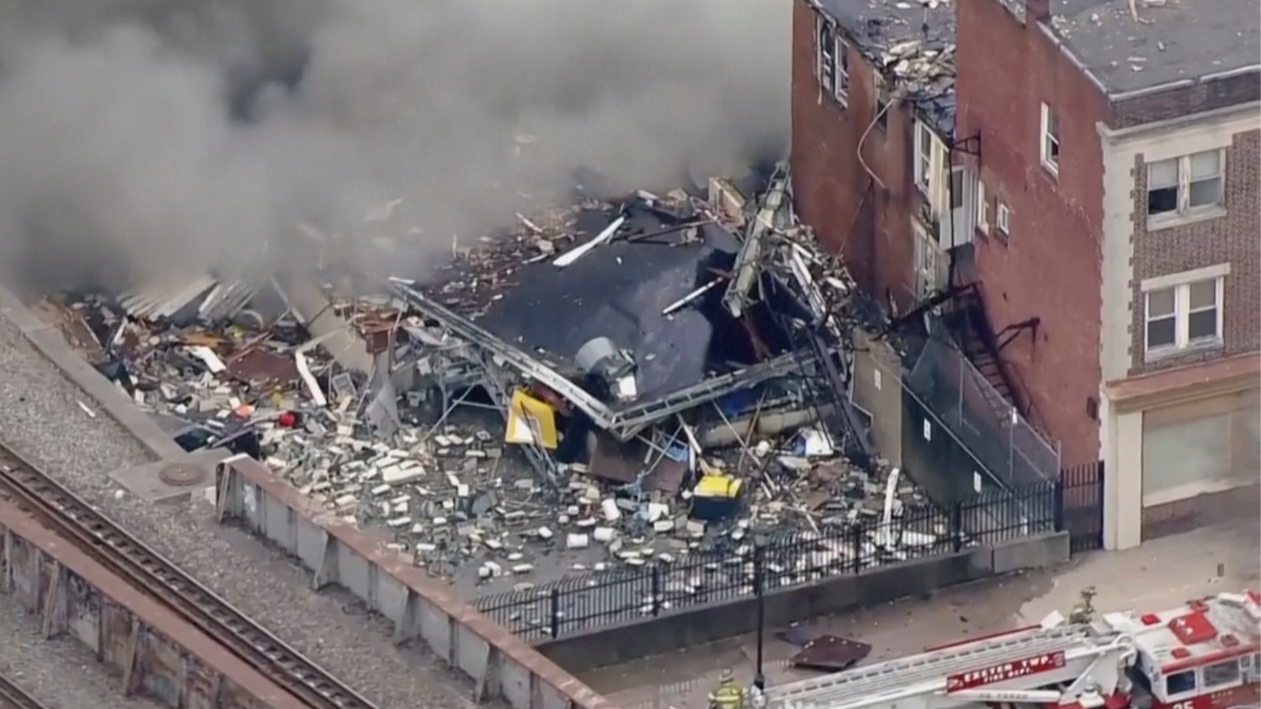 Smoke rises from an explosion at the R.M. Palmer Co. plant in West Reading, Pa. on, Friday, March 24, 2023. (WPVI-TV/6ABC via AP)