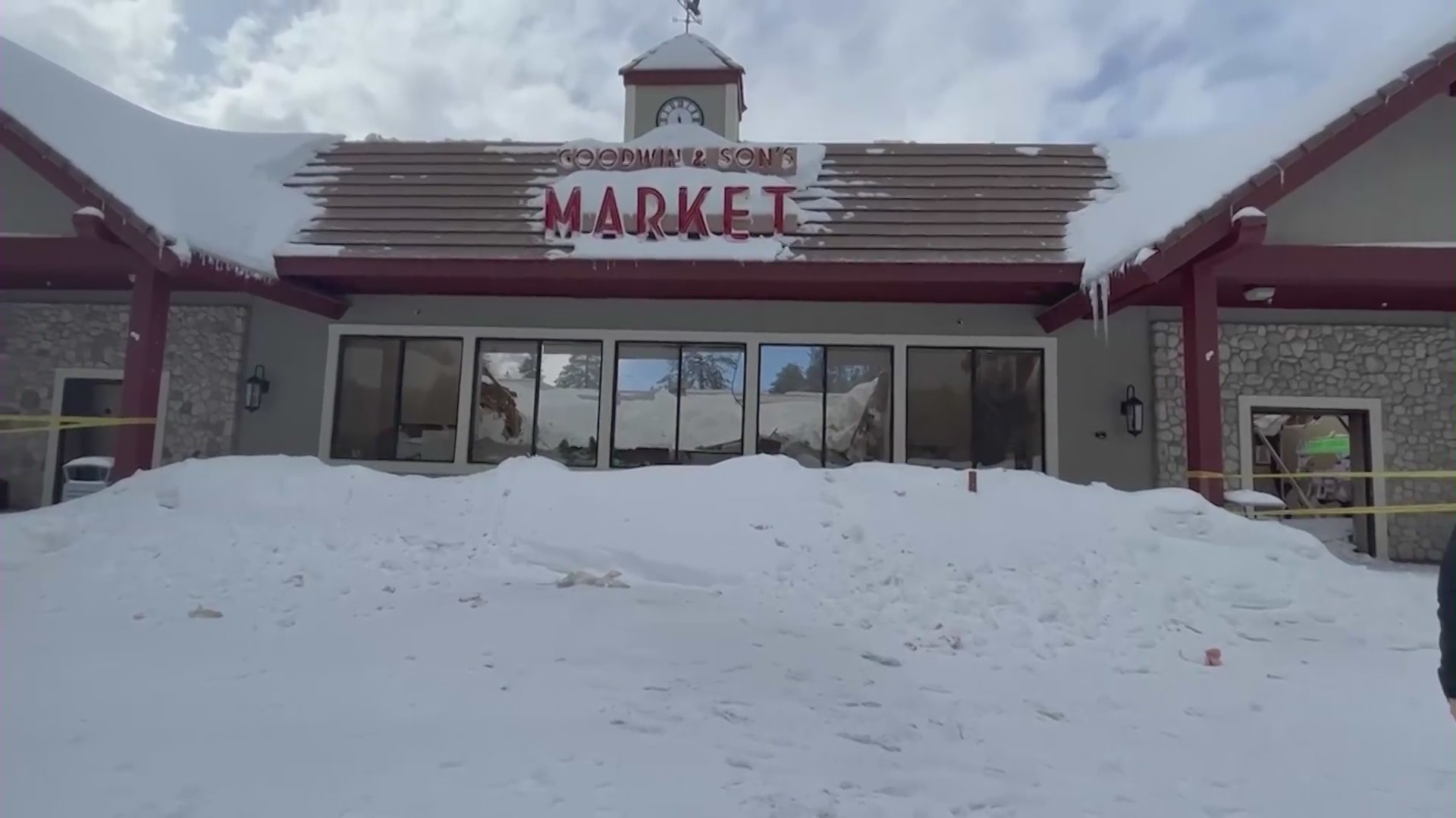 The roof of Goodwin's Market, the only grocery store in Crestline, collapsed under the weight of snow on Mar. 1, 2023, forcing the store to close. (Aron Hjartsason)