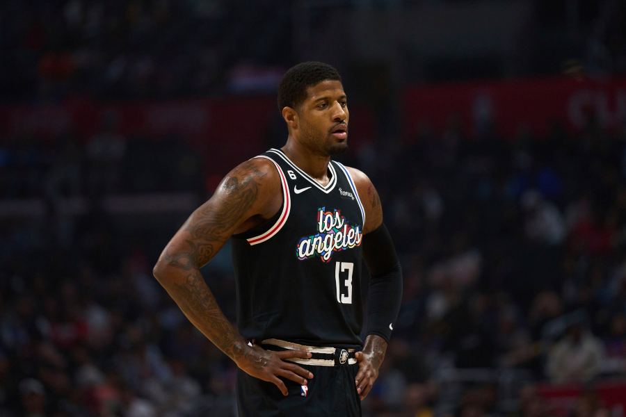 Los Angeles Clippers forward Paul George looks down the court during the first half of an NBA basketball game against the Orlando Magic Saturday, March 18, 2023, in Los Angeles. (AP Photo/Allison Dinner)