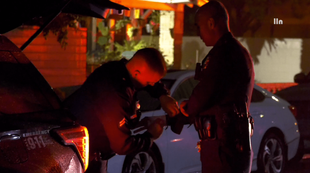 An LAPD officer gets his hand wrapped after being injured while apprehending a stolen ambulance suspect on March 20, 2023. (LLN)