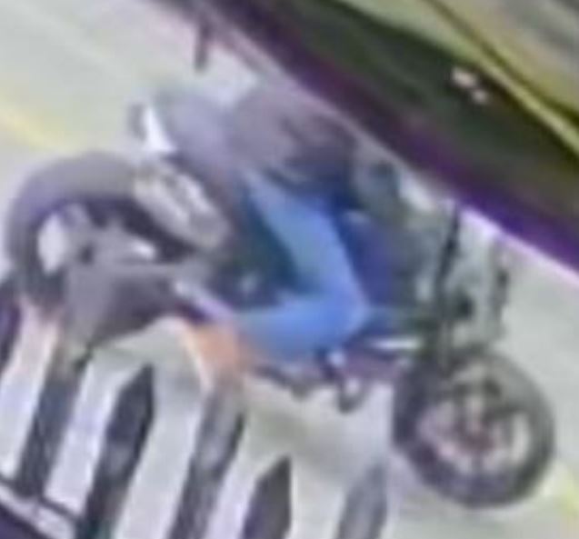 Motorcycle suspect seen in a surveillance video moments before a hit-and-run crash in Boyle Heights on March 30, 2023. (LAPD)