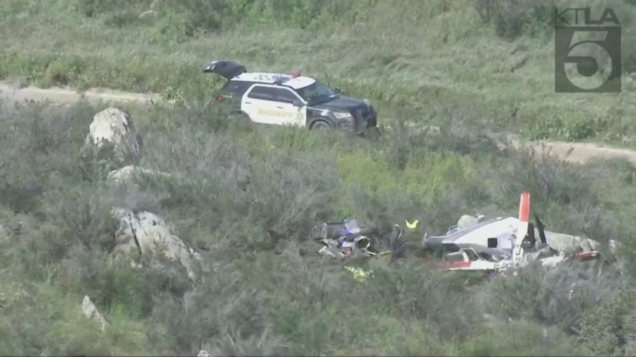 A Riverside County Sheriff's Department vehicle blocks the area where a helicopter crashed in Perris, killing two people on March 24, 2023. (KTLA) 