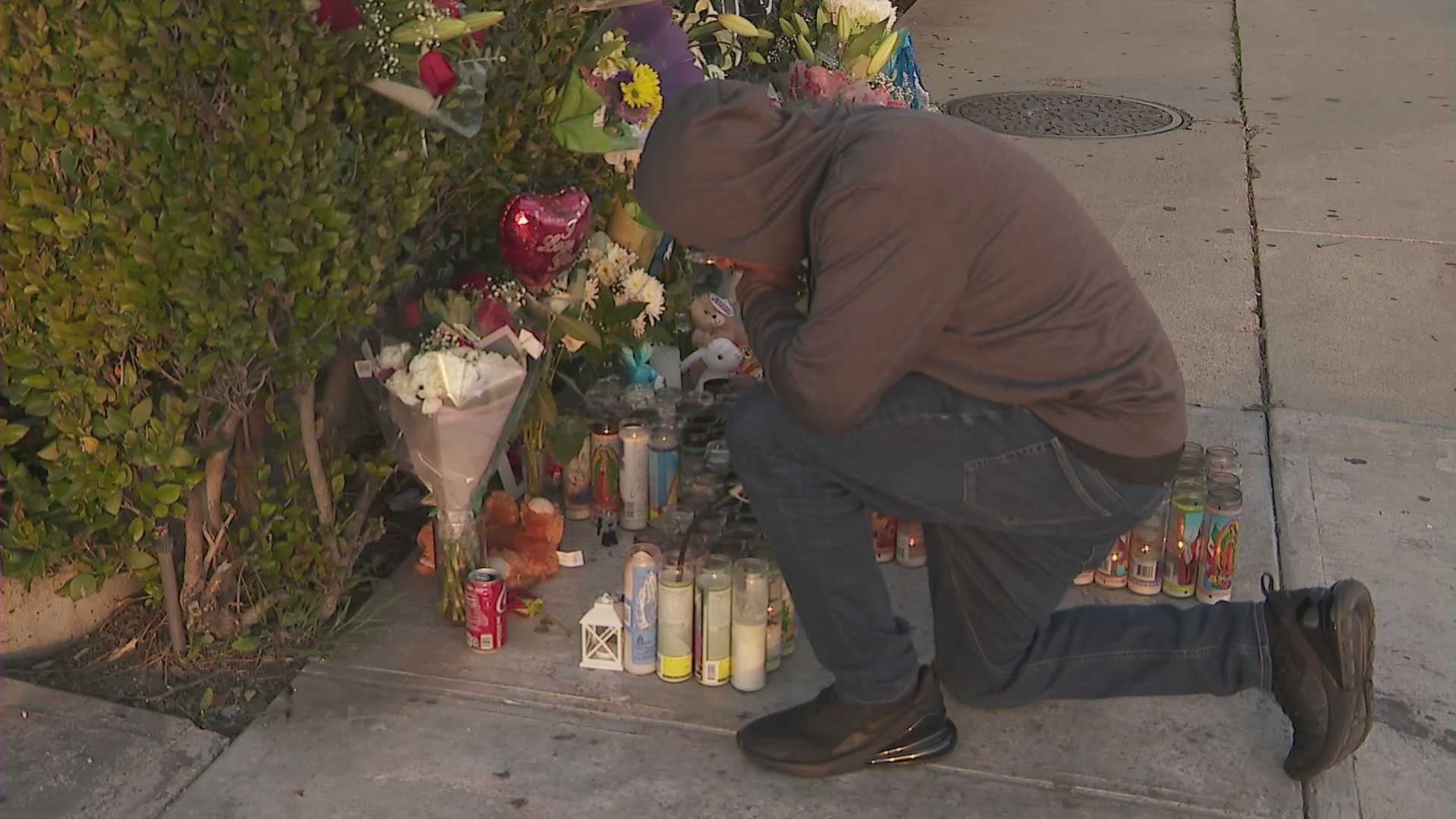 Loved ones mourn Xavier Chavarin in an El Sereno memorial on March 7, 2023. (KTLA)