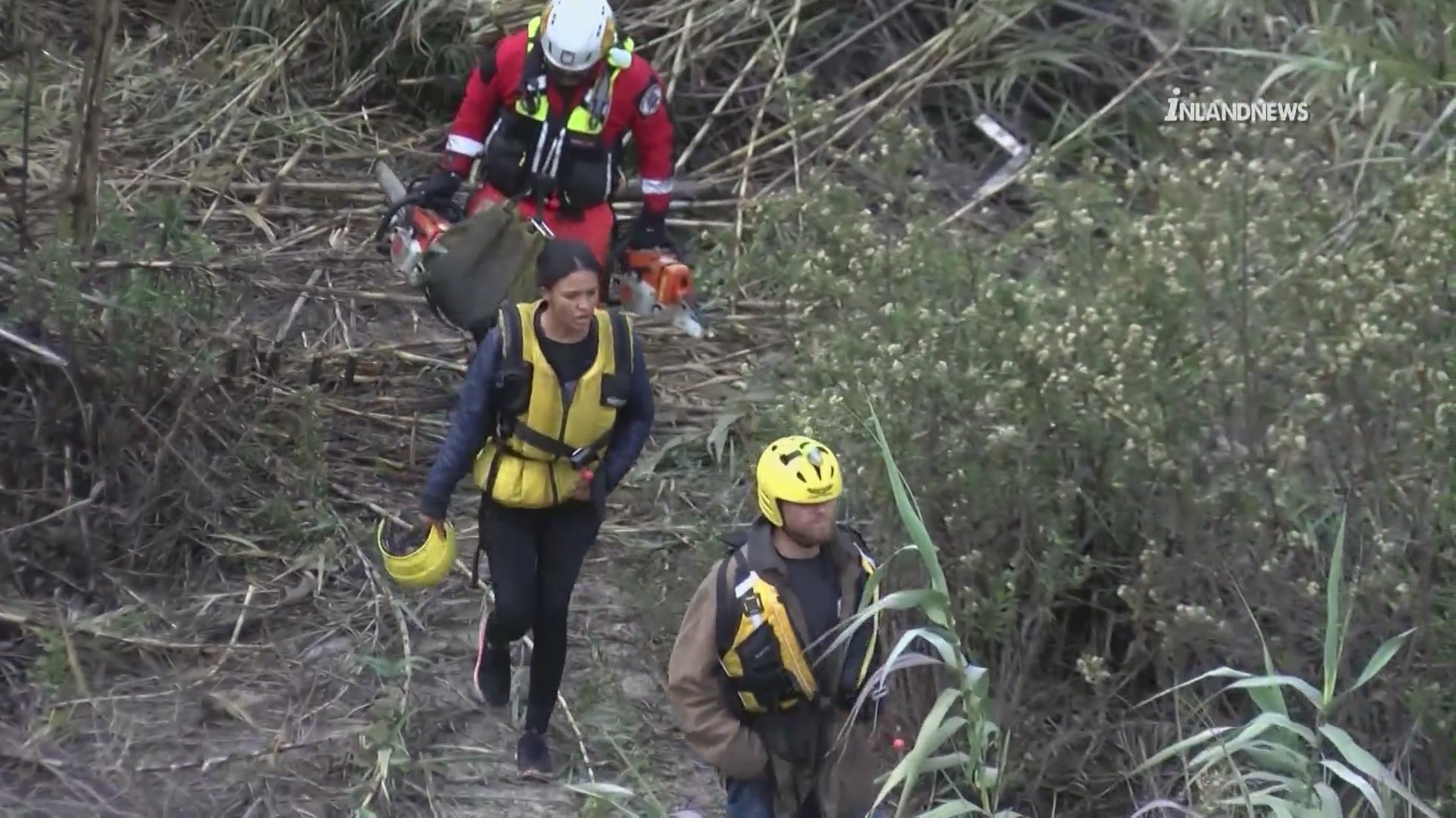 Drivers rescued from flooded Santa Ana River in Jurupa Valley.(Inland News)