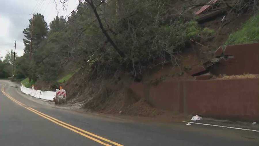 Stormy weather across Southern California continued causing destruction on Wednesday, downing trees and powerlines while causing sinkholes and mudslides. (KTLA)