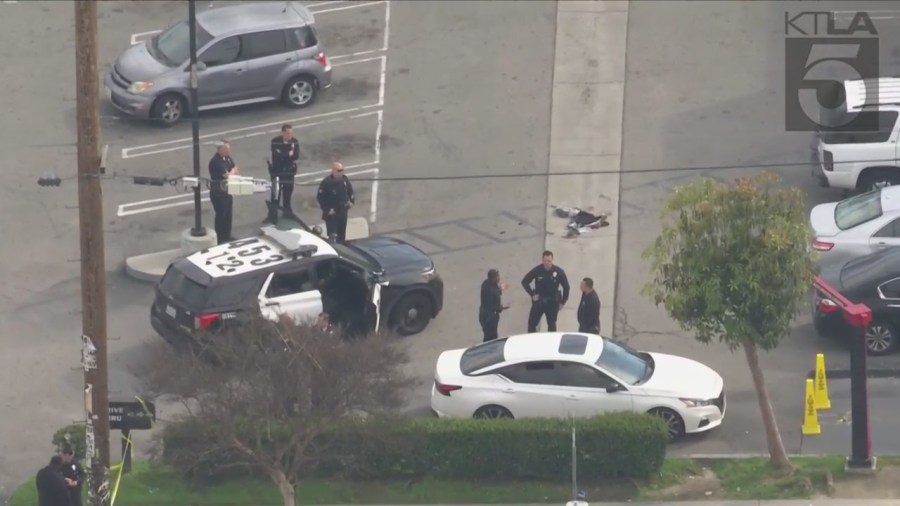 Police investigating a shooting outside of a Burger King in South Los Angeles on March 17, 2023. (KTLA)