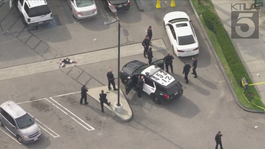 Police investigating a shooting outside of a Burger King in South Los Angeles on March 17, 2023. (KTLA)