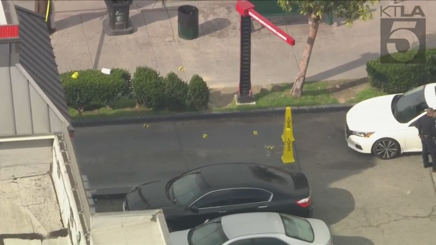 Police investigating a shooting outside of a Burger King in South Los Angeles on March 17, 2023. (KTLA)