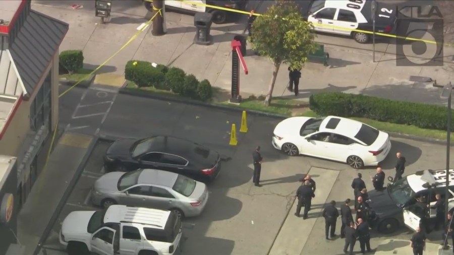 Police investigating a shooting outside of a Burger King in South Los Angeles on March 17, 2023. (KTLA)