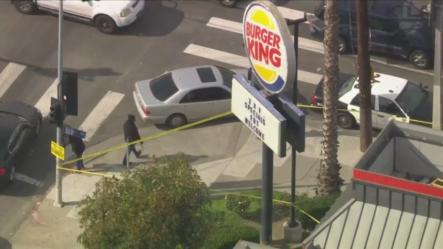 Police investigating a shooting outside of a Burger King in South Los Angeles on March 17, 2023. (KTLA)