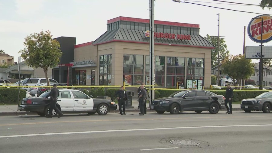 Police investigating a shooting outside of a Burger King in South Los Angeles on March 17, 2023. (KTLA)