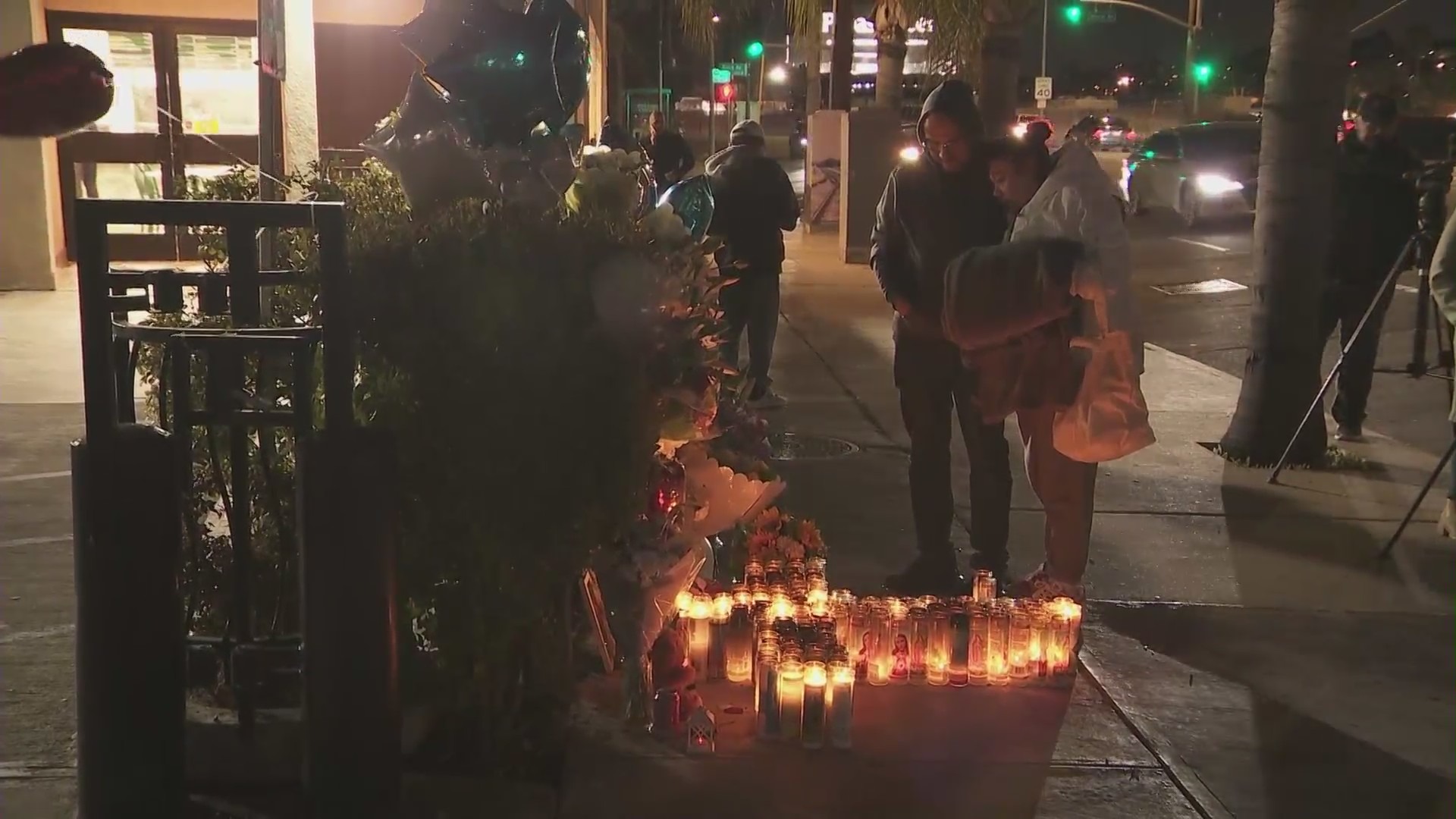 Loved ones mourn Xavier Chavarin in an El Sereno memorial on March 7, 2023. (KTLA)