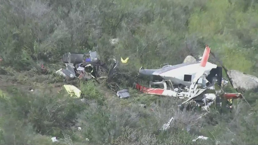 The scene of a helicopter crash that killed two people in a remote area just east of Perris on March 24, 2023. (KTLA)