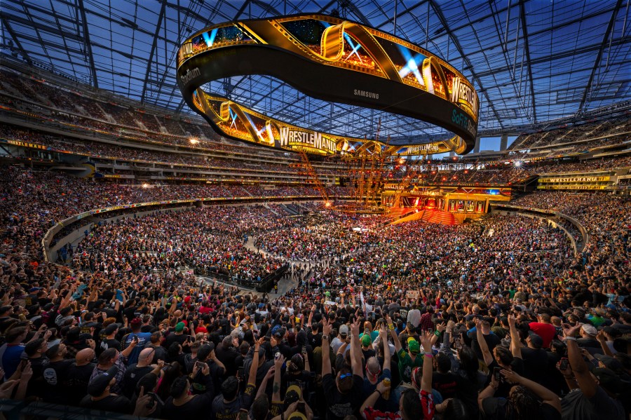 In this photo provided by WWE, Over 80,000 attend the first night of WrestleMania 39 at SoFi Stadium in Inglewood, Calif., Saturday, April 1, 2023. It was announced Monday that Endeavor had signed an agreement with WWE to form a new, publicly listed company that will house UFC and WWE under one roof. (WWE via AP)