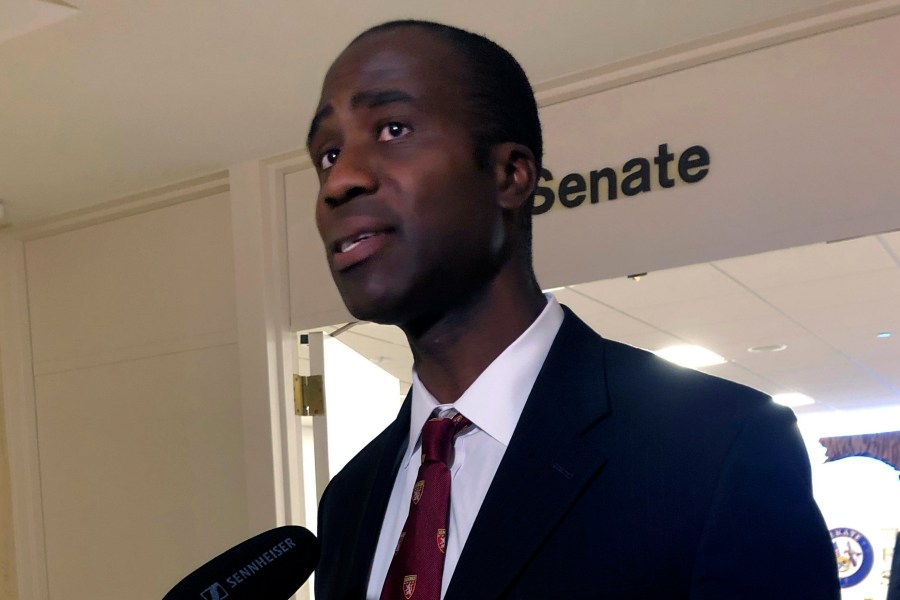 FILE - Dr. Joseph Ladapo speaks with reporters after the Florida Senate confirmed his appointment as the state's surgeon general on Feb. 23, 2022, in Tallahassee, Fla. An analysis that was the basis of a highly criticized recommendation from Florida’s surgeon general cautioning young men against getting the COVID-19 vaccine omitted information that showed catching the virus could increase the risk of a cardiac-related death much more than getting the shot. That's according to drafts of the analysis obtained by the Tampa Bay Times. (AP Photo/Brendan Farrington, File)