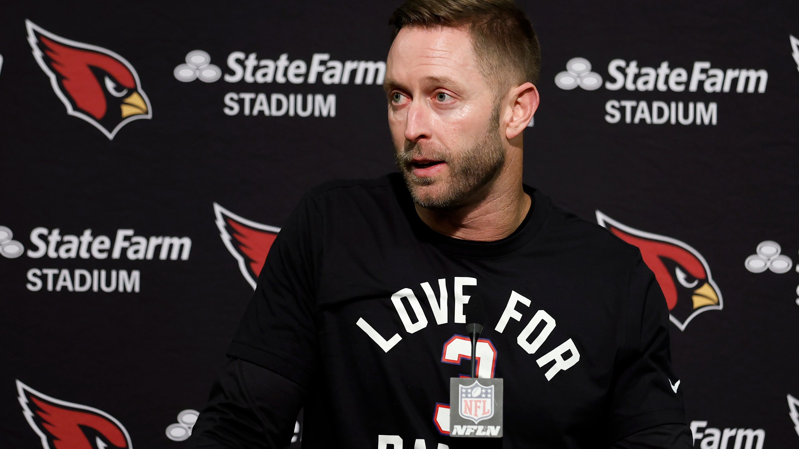 FILE - Arizona Cardinals head coach Kliff Kingsbury wears a shirt in support of Buffalo Bills' Damar Hamlin as he speaks at a news conference after the team's NFL football game against the San Francisco 49ers in Santa Clara, Calif., Sunday, Jan. 8, 2023. Kingsbury is joining Lincoln Riley's coaching staff at Southern California as a senior offensive analyst. USC announced the addition Tuesday, April 11, 2023. (AP Photo/Jed Jacobsohn, File)