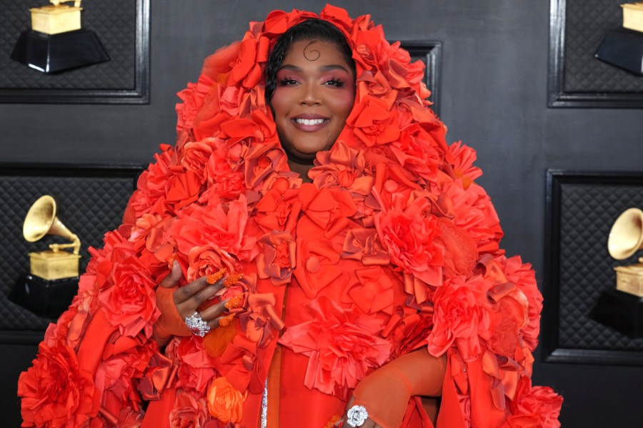 FILE - Lizzo arrives at the 65th annual Grammy Awards on Feb. 5, 2023, in Los Angeles. In a concert Friday, April 21, 2023 in Knoxville, Tenn., Lizzo filled the stage with drag queens in a glittery protest against the state's legislation designed to restrict drag performances in public. (Photo by Jordan Strauss/Invision/AP)