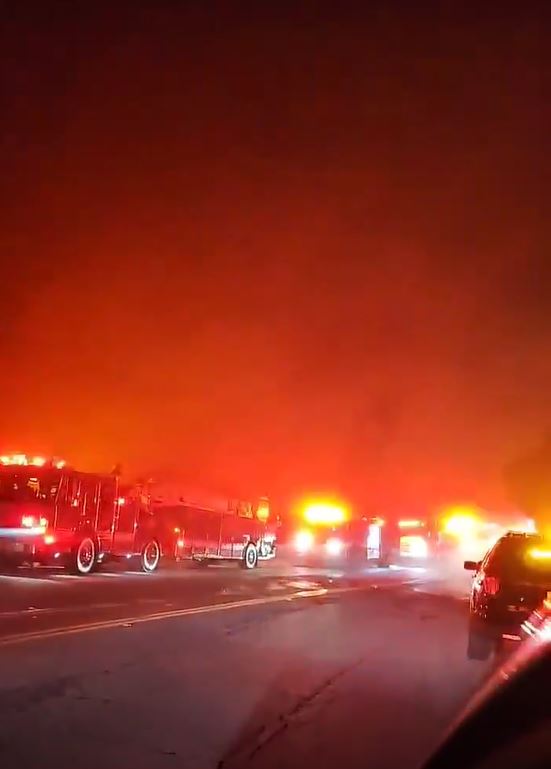 Los Angeles Fire Department crews are searching for a possible missing aircraft amid heavy fog in Sherman Oaks on April 29, 2023. (Citizen)