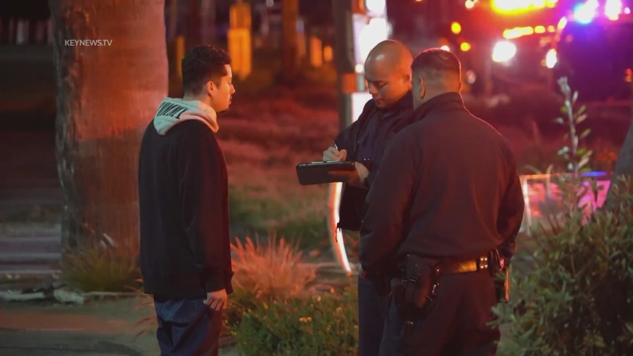 The 21-year-old suspected DUI driver being taken into custody following a deadly crash in Pacific Palisades on April 8, 2023. (KeyNews.TV)