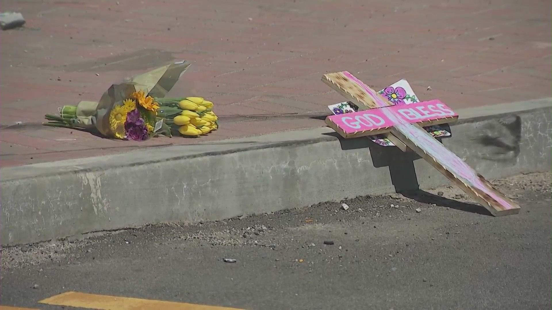 Makeshift memorial at the train tracks where an 11-year-old girl was killed and her mother was critically injured after being struck by a train in Redlands on April 4, 2023. (KTLA)