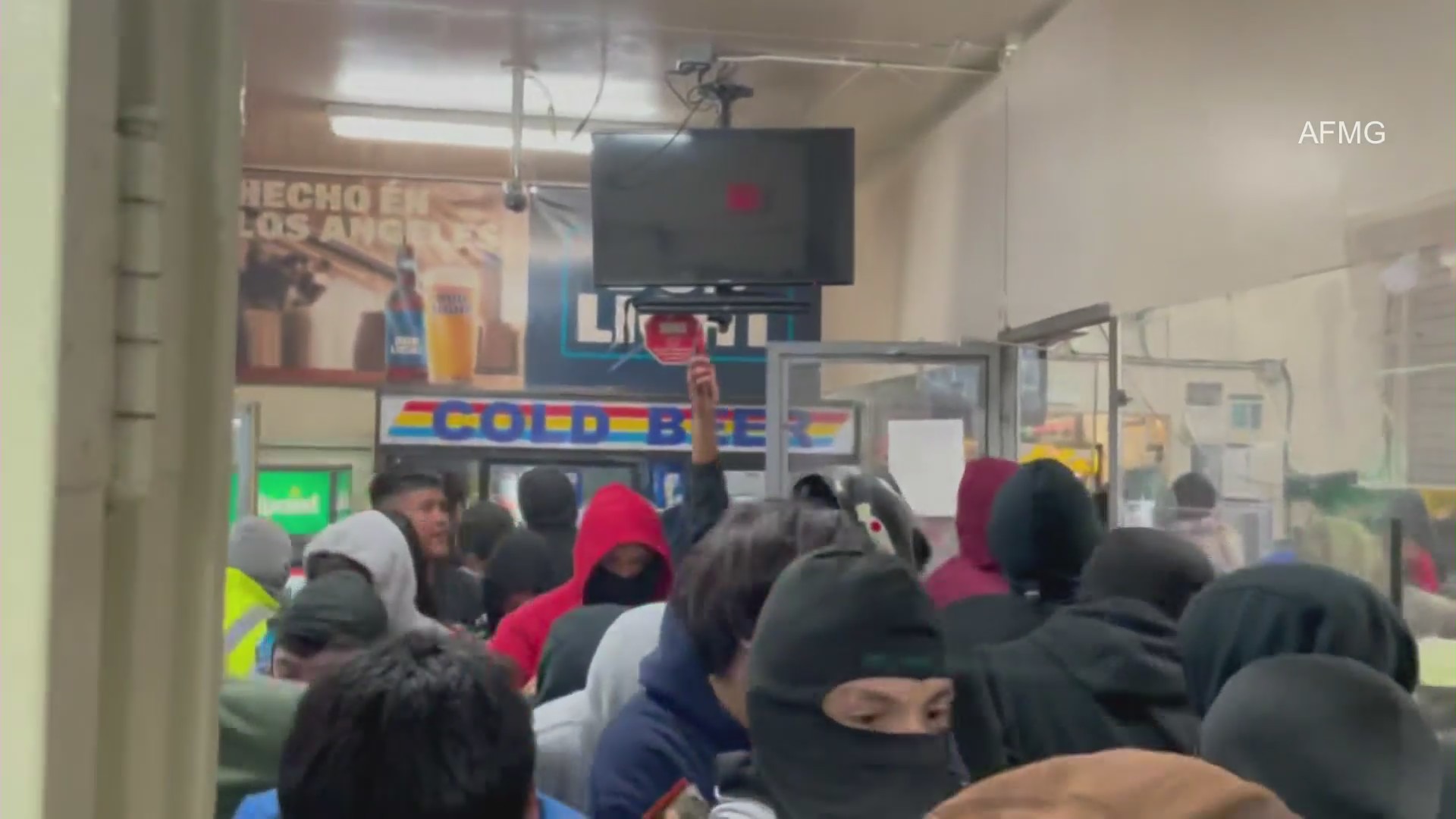 A street takeover in Compton on April 16, 2023 was followed by a large mob breaking down the door of a gas station and stealing thousands of dollars worth of merchandise. (AFMG)