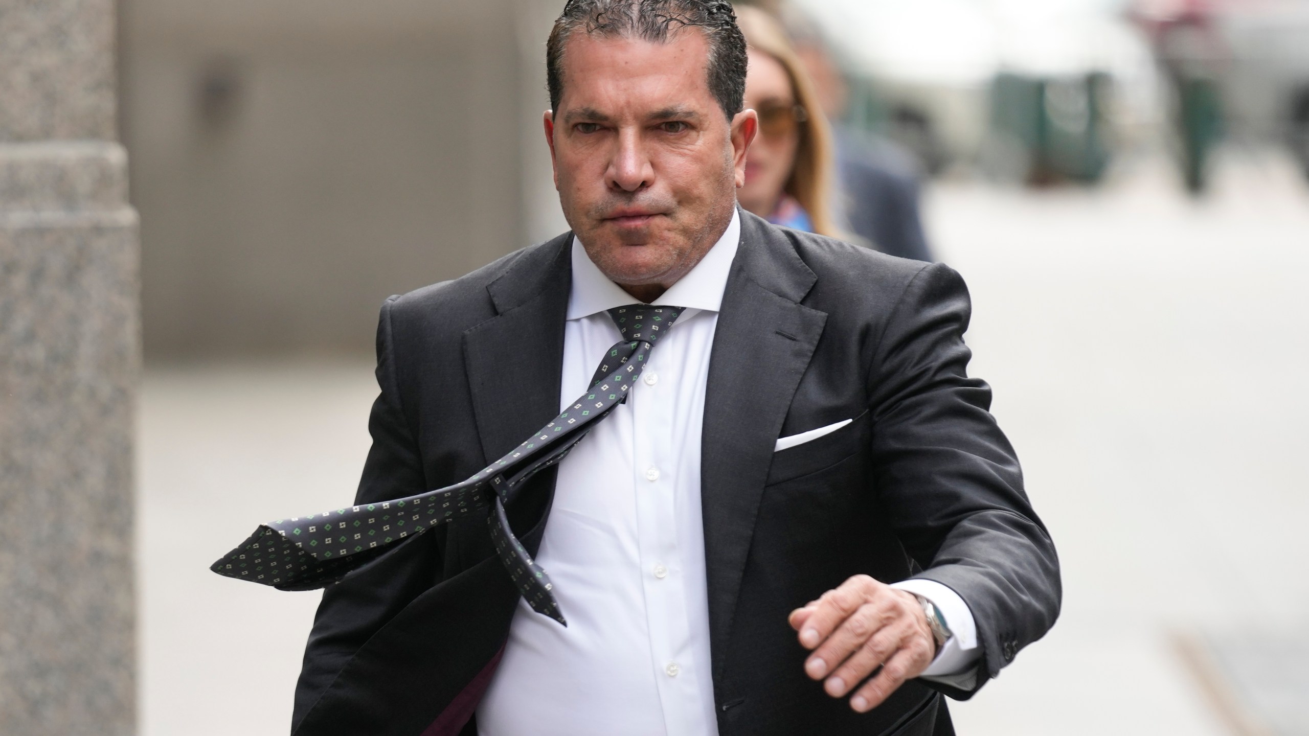 Joe Tacopina, Donald Trump's lawyer, arrives in Manhattan federal court in New York, Tuesday, May 9, 2023. A jury in New York City is set to begin deliberations in a civil trial over advice columnist E. Jean Carroll's claims that Trump raped her in a luxury Manhattan department store. (AP Photo/Seth Wenig)