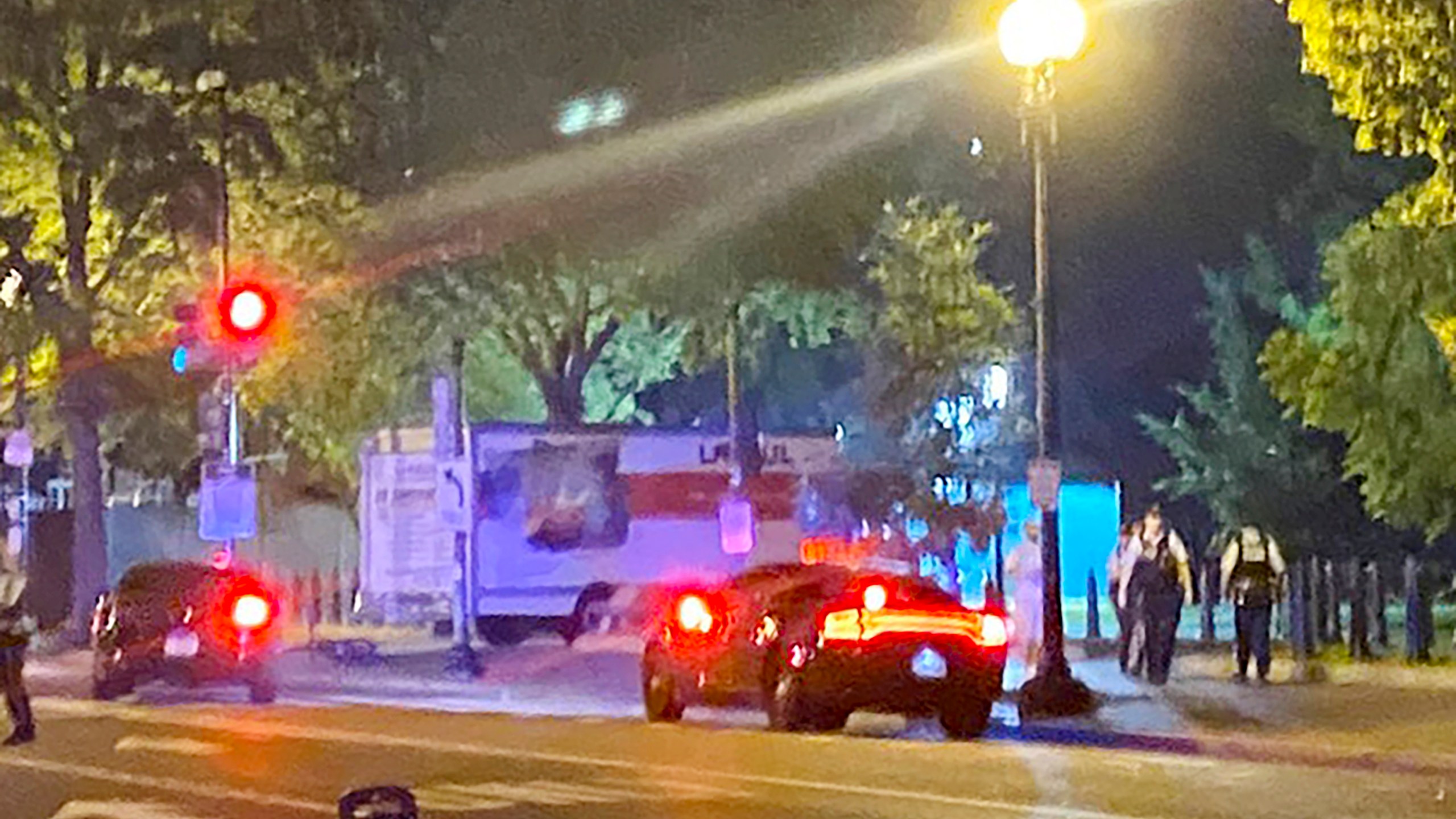 A box truck is seen crashed into a security barrier at a park across from the White House, Monday night, May 22, 2023 in Washington. Police have arrested a man they believe intentionally crashed a U-Haul truck into a security barrier near the north side of Lafayette Square late Monday night. No one was injured. (Benjamin Berger via AP)