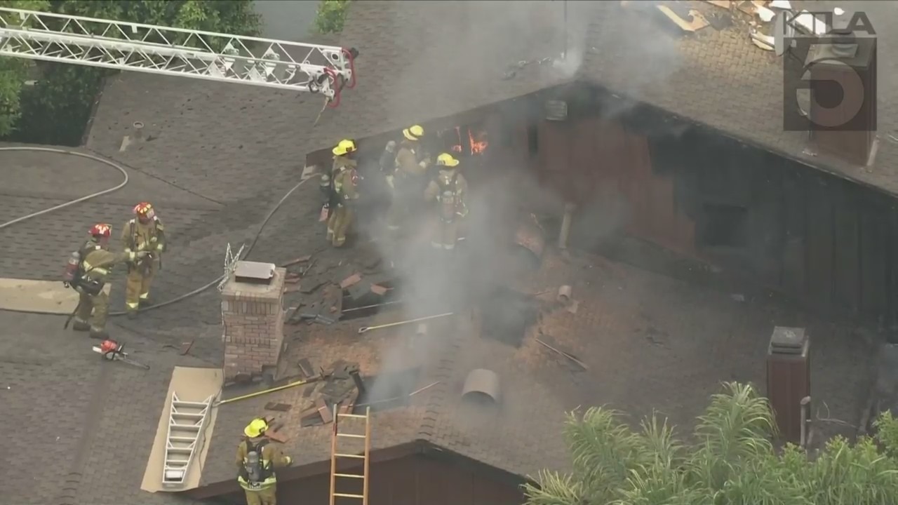 Firefighters kept a house fire in Encino from spreading to other structures on May 19, 2023. (KTLA)