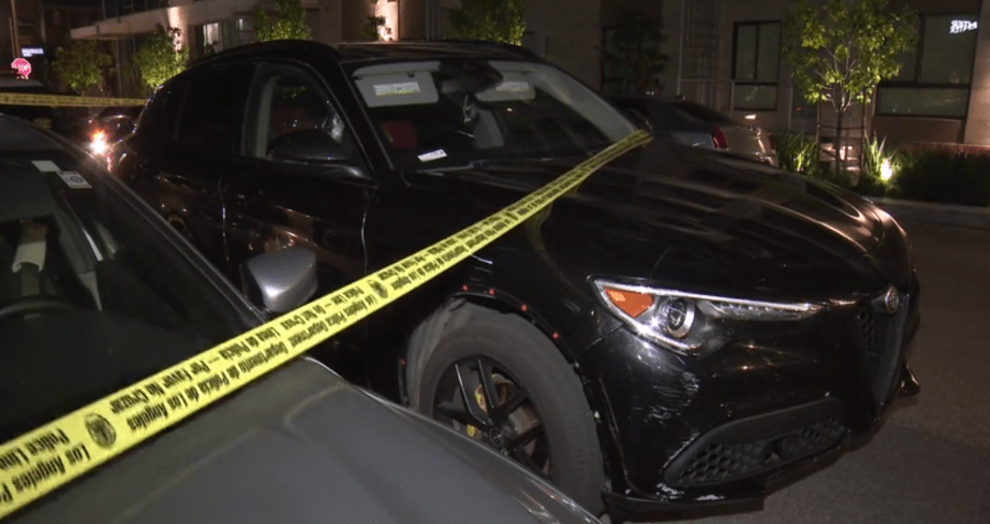 After a shooting at a nearby gas station, what is believed to be the vehicle the victim arrived in was found peppered with bullet holes on May 10, 2023. (KTLA)