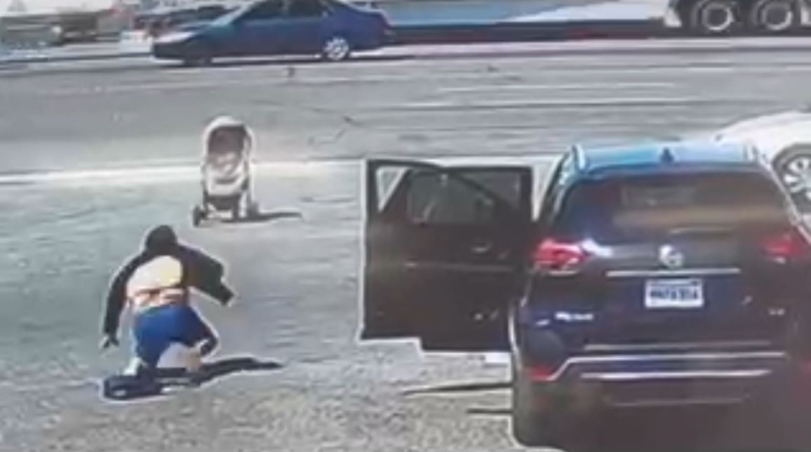 Security video captures the terrifying moment a baby stroller nearly rolls into oncoming traffic in Hesperia on May 1, 2023. (OnScene.TV)