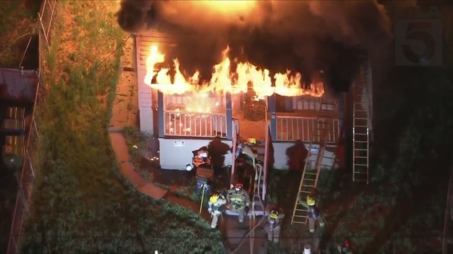 Los Angeles firefighters battled a massive house fire in Echo Park on May 5, 2023. (KTLA)