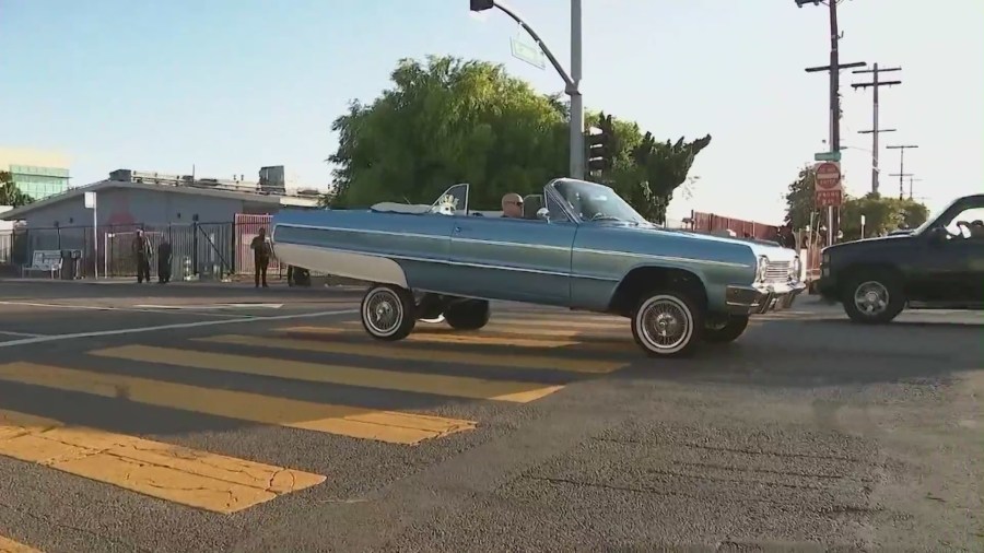 Locals upset over LAPD’s “No Stopping” signs ahead of lowrider cruise event in Highland Park on May 20, 2023. (KTLA)