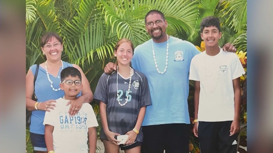 Guillermo Medina and his family are seen in a photo provided by a family attorney on Jan. 31, 2023.