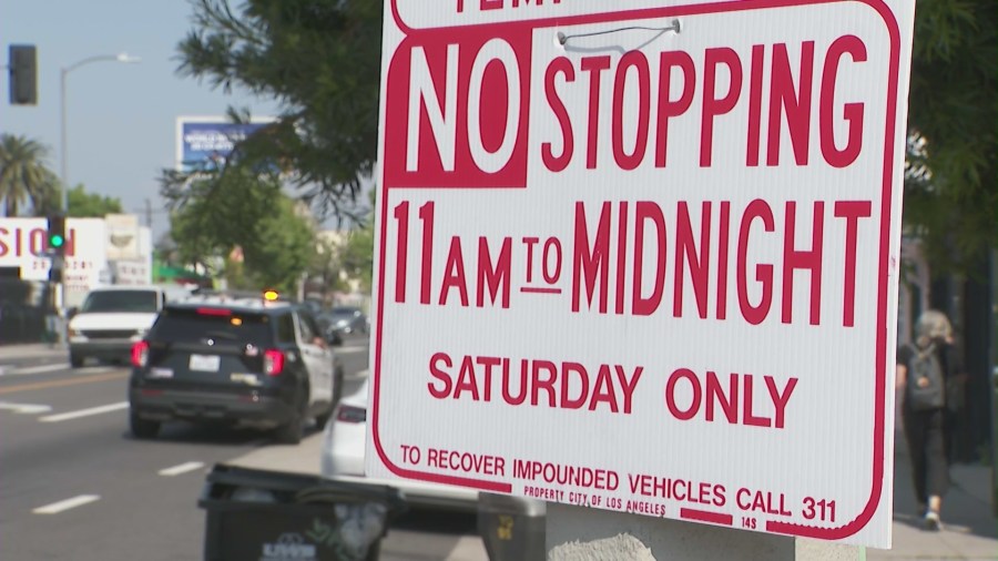 Locals upset over LAPD’s “No Stopping” signs ahead of lowrider cruise event in Highland Park on May 20, 2023. (KTLA)