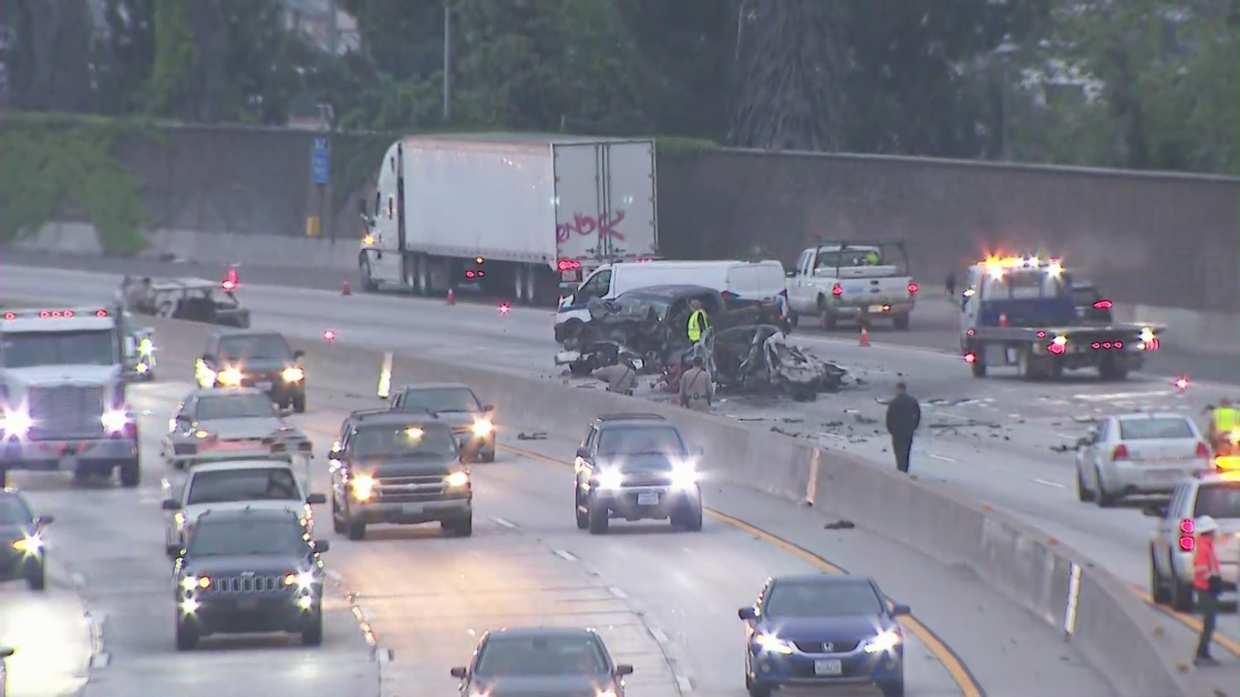 Authorities investigate a fiery wrong-way crash along the 101 Freeway in East Hollywood on May 8, 2023. (KTLA)